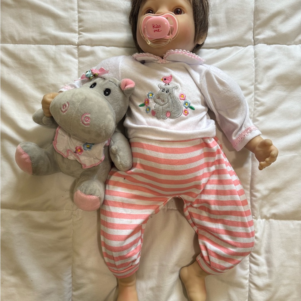 Baby Doll with Pink Striped Outfit and Hippo Toy